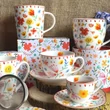 Kép 3/3 - Virágmintás  porcelánbögre 460 ml